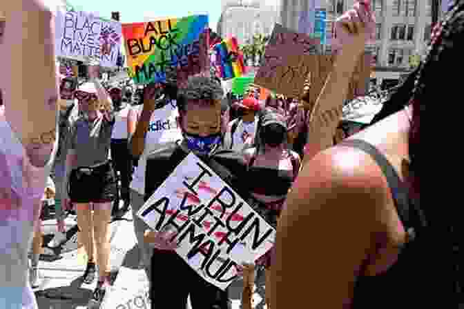 A Group Of Black Youth Marching In A Protest Democracy Remixed: Black Youth And The Future Of American Politics (Transgressing Boundaries: Studies In Black Politics And Black Communities)