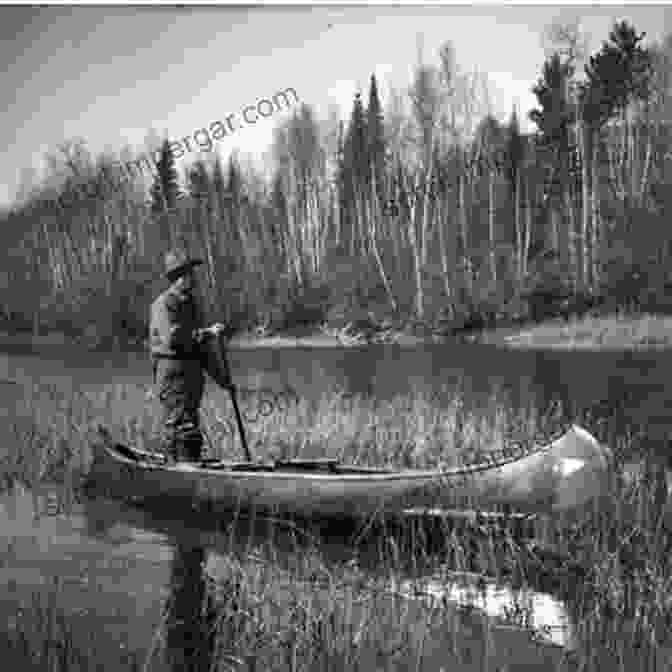 A Photo Of Sigurd Olson Sitting In A Canoe In The Wilderness. Of Time And Place Sigurd F Olson