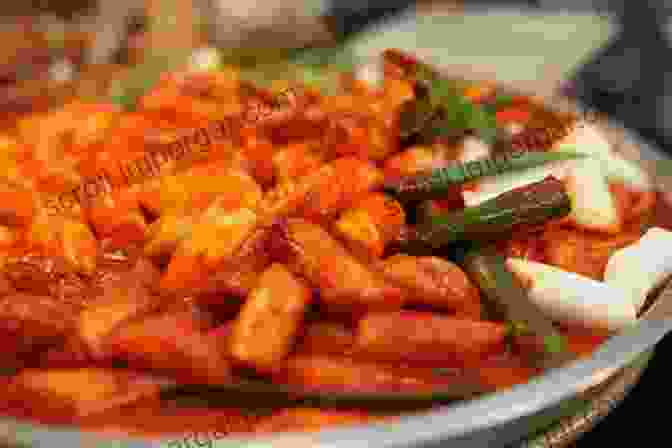 A Vibrant Spread Of Korean Delicacies, Including Spicy Kimchi And Chewy Tteokbokki Korea Carlos R Smith